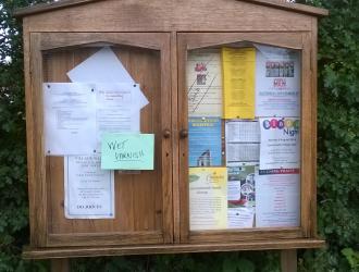 Newly refurbished village notice board